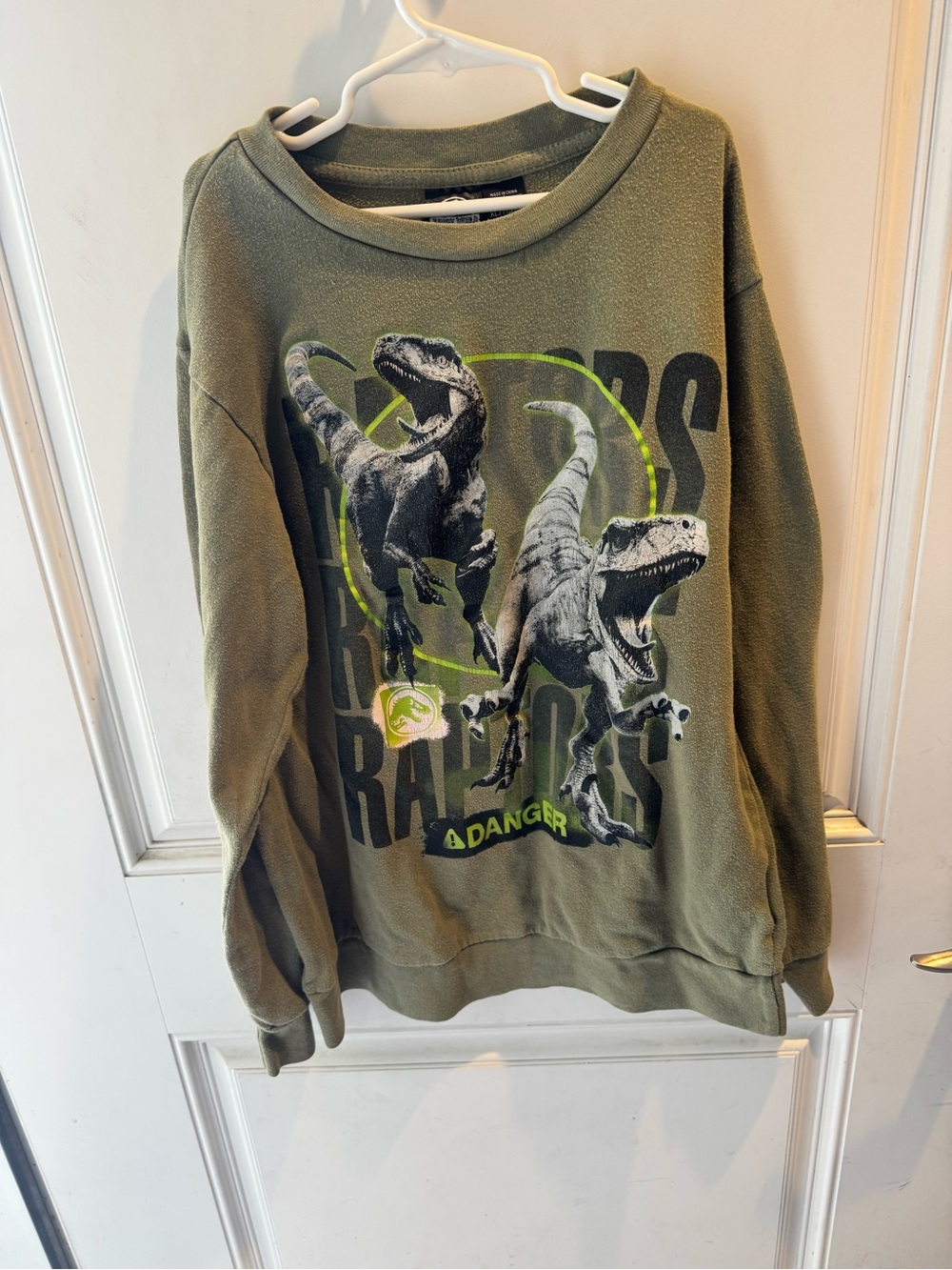Jurassic World
Olive Green Men’s Dinosaur Graphic Sweatshirt
